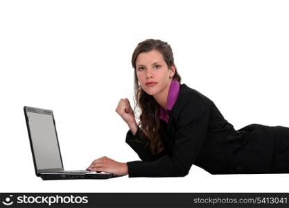 Businesswoman lying on the floor