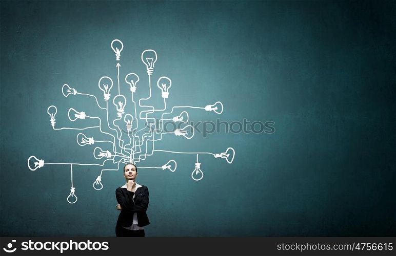Businesswoman making decision. Young pensive businesswoman and ideas coming out of her head