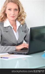 Businesswoman on laptop