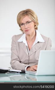 Businesswoman on laptop