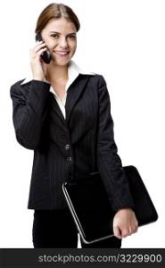 Businesswoman on phone with laptop