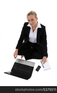 Businesswoman on the floor with computer