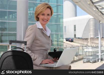 Businesswoman outside airport