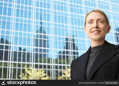 Businesswoman outside office building portrait
