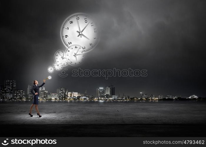 Businesswoman play pipe. Young pretty businesswoman playing melody on trumpet