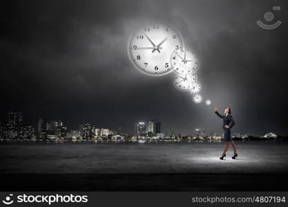 Businesswoman play pipe. Young pretty businesswoman playing melody on trumpet