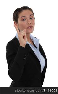 Businesswoman pointing her finger
