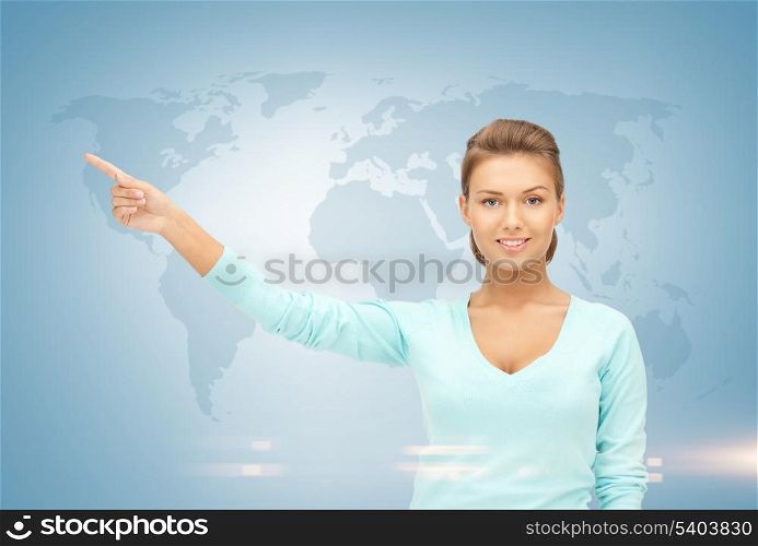 businesswoman pointing her finger at world map