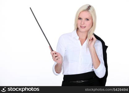 Businesswoman pointing with a stick