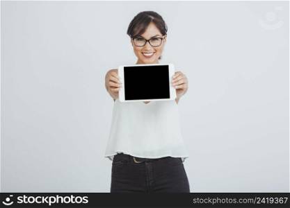 businesswoman posing with tablet
