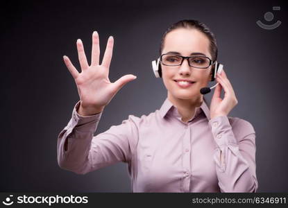 Businesswoman pressing virtual button in business concept