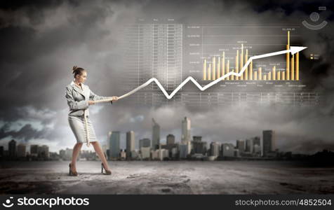 Businesswoman pulling graphic. Image of businesswoman pulling graph of diagram