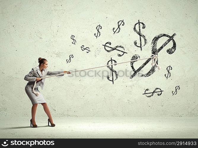 Businesswoman pulling rope