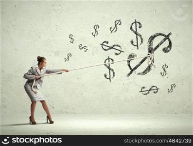 Businesswoman pulling rope. Image of attractive businesswoman pulling rope with dollar symbol