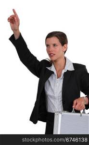 businesswoman raising her hand