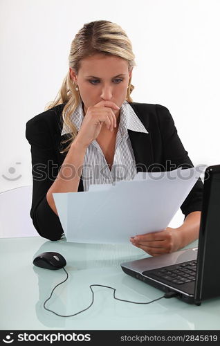 Businesswoman reading a document