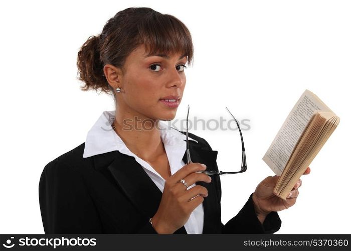 Businesswoman reading book