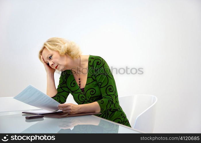 Businesswoman reading document