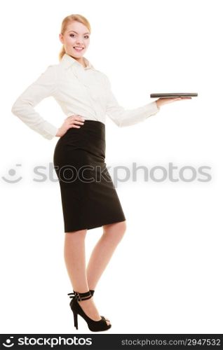 Businesswoman recommending your product. Elegant young woman showing blank copy space on hand isolated. Business advertisement.
