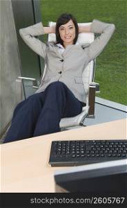Businesswoman relaxing in an office