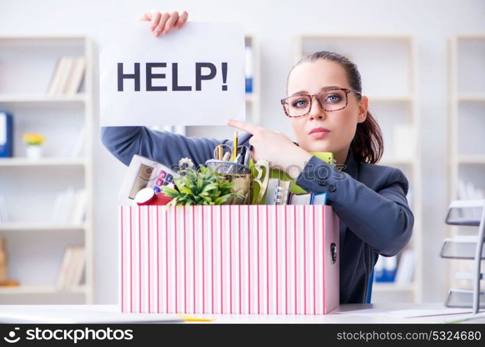 Businesswoman resigning from her job. The businesswoman resigning from her job