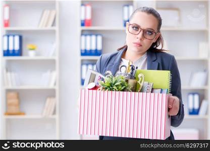 Businesswoman resigning from her job. The businesswoman resigning from her job