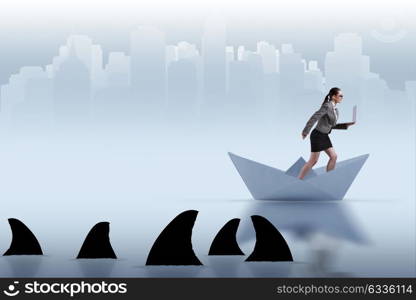 Businesswoman riding paper boat ship in business concept