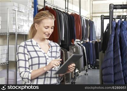Businesswoman Running On Line Fashion Business With Digital Tablet