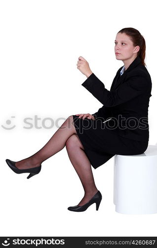 Businesswoman sat thinking