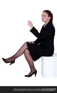 Businesswoman sat thinking