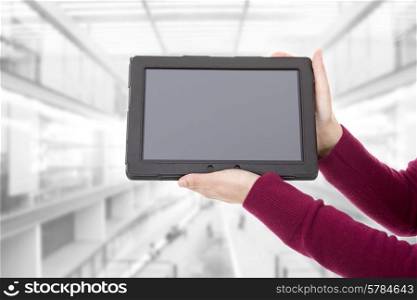 businesswoman showing a tablet pc, at the office