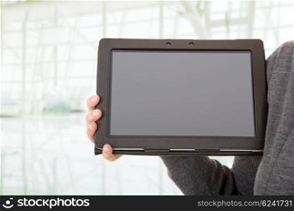 businesswoman showing a tablet pc at the office