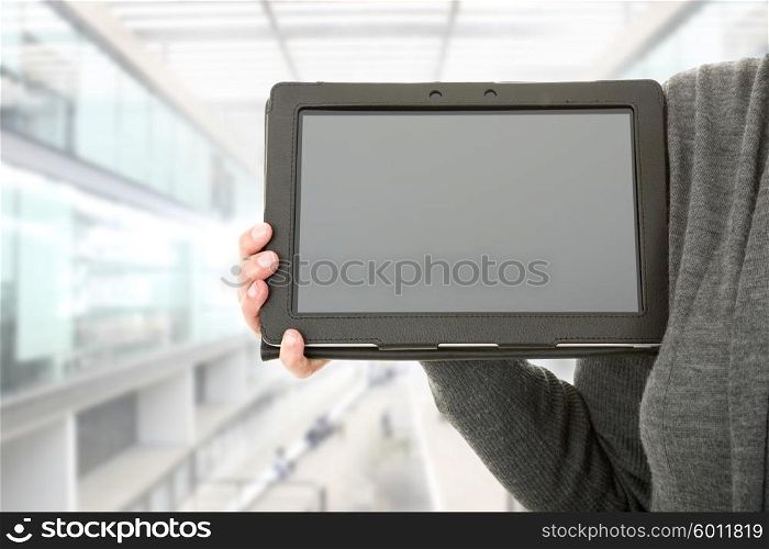 businesswoman showing touch pad at the office
