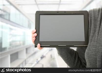 businesswoman showing touch pad at the office