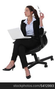 Businesswoman sitting in a chair