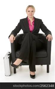 Businesswoman Sitting In Leather Chair