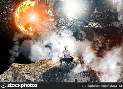 Businesswoman sitting in lotus flower position against space background