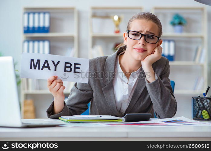 Businesswoman sitting in office with message