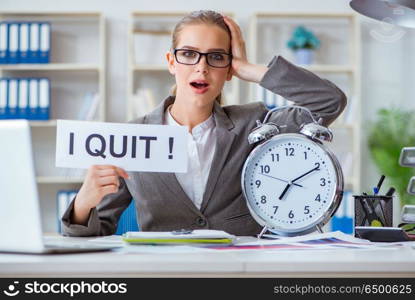 Businesswoman sitting in office with message