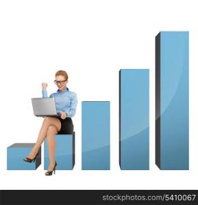 businesswoman sitting on big 3d chart with laptop
