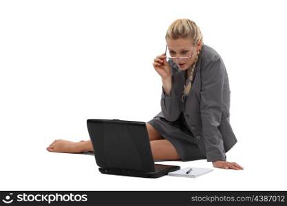 Businesswoman sitting on the floor