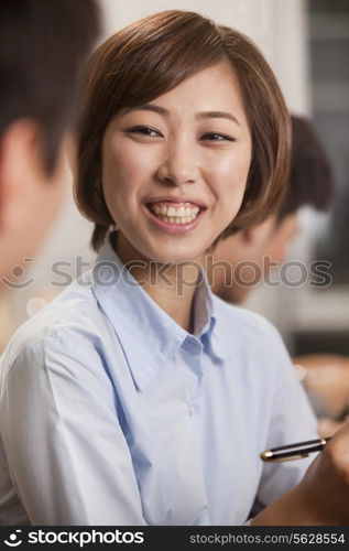 Businesswoman Smiling and Working