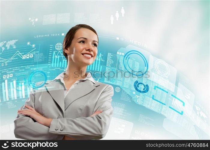 Businesswoman smiling. Image of attractive businesswoman against hightech background