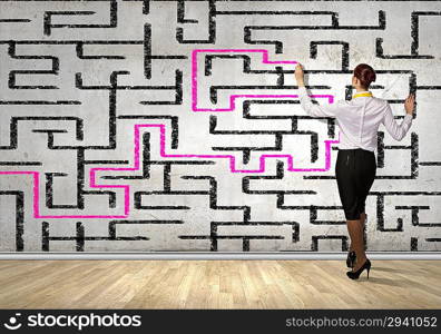 Businesswoman solving maze problem