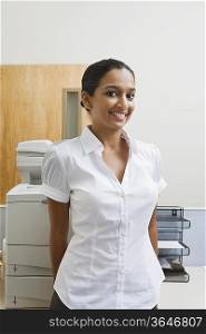 Businesswoman Standing by Photocopier