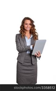 Businesswoman standing on white background with touchpad
