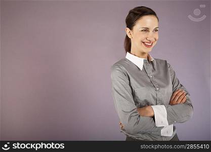 Businesswoman Standing with Arms Crossed