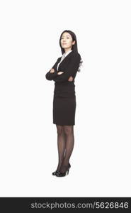 Businesswoman standing with arms crossed