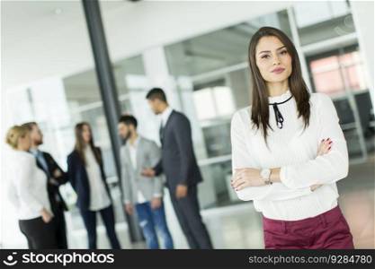 Businesswoman standing with her arms crossed
