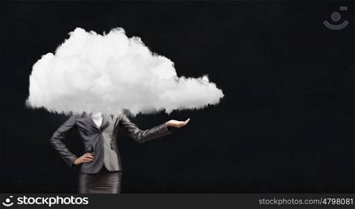 Businesswoman standing with his head in cloud. Floating in sky